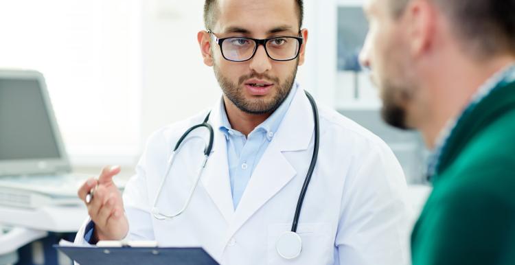 Doctor talking to patient