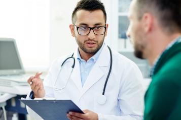 Doctor talking to patient